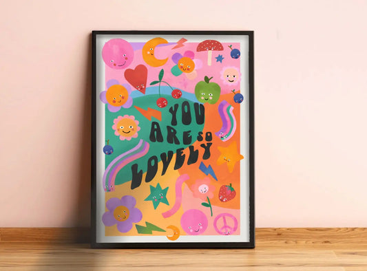 colourful children's print with flowers, hearts and more and black text reading 'you are so lovely'