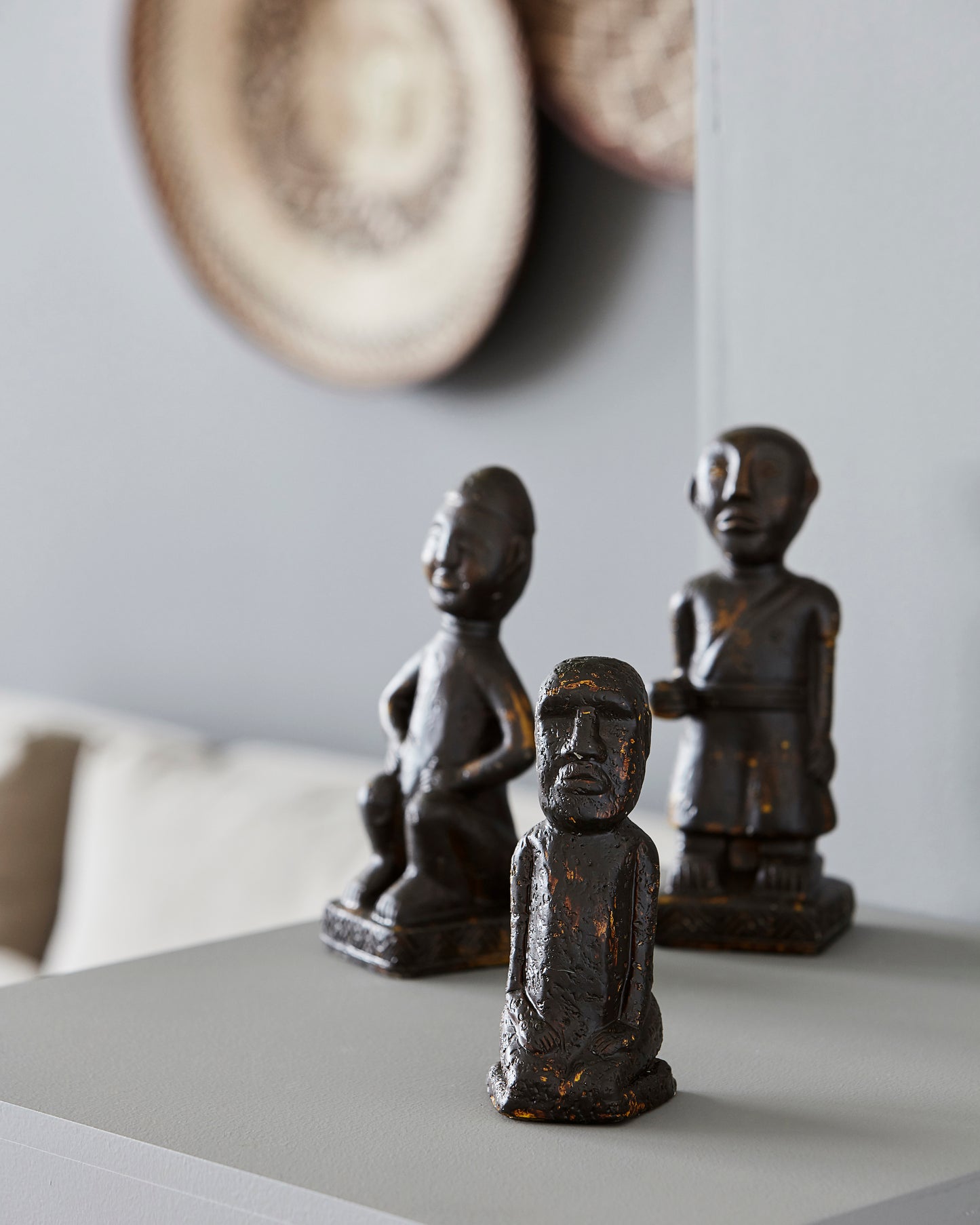 sitting cement figurine