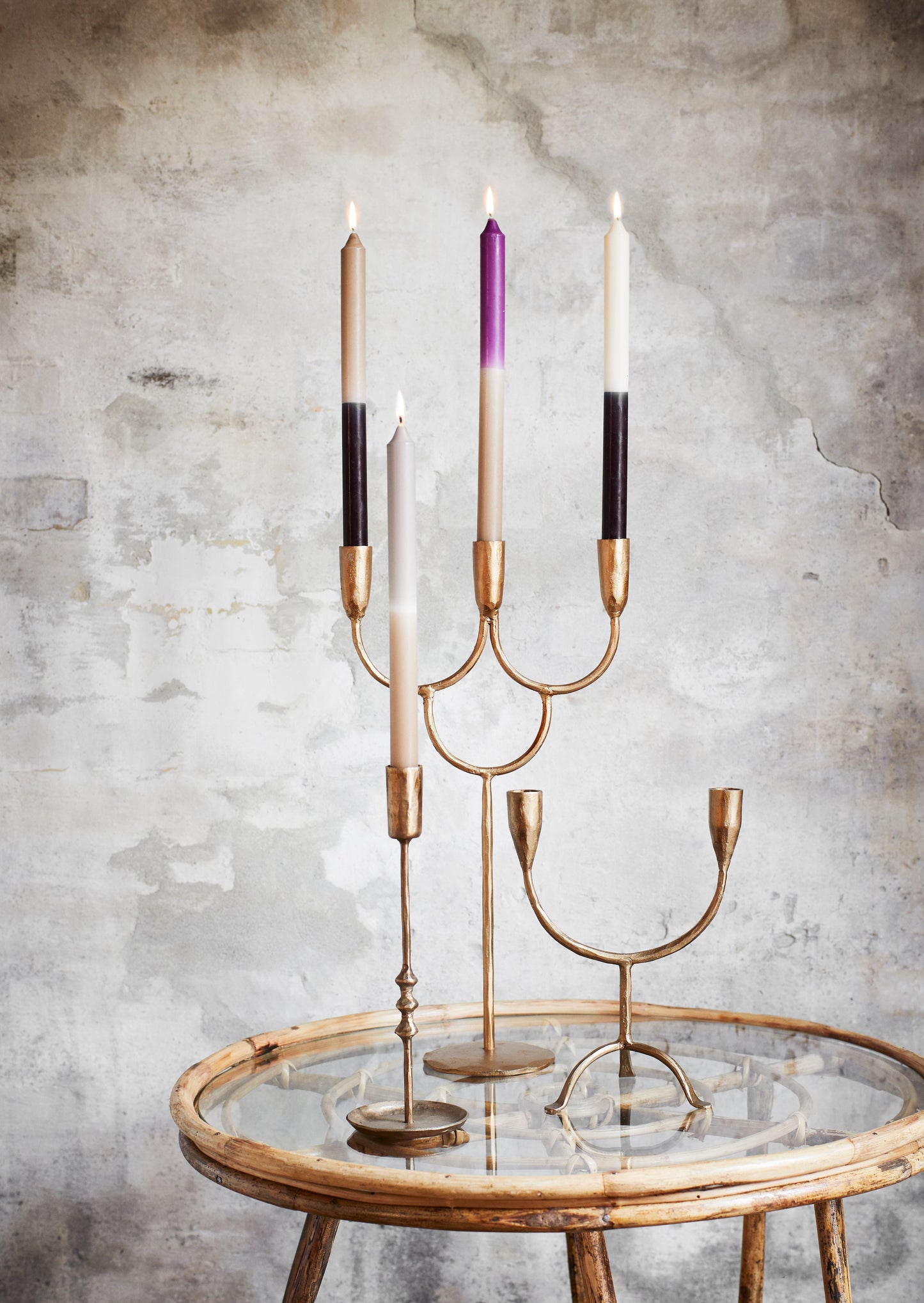 four candlesticks with four two tone candles