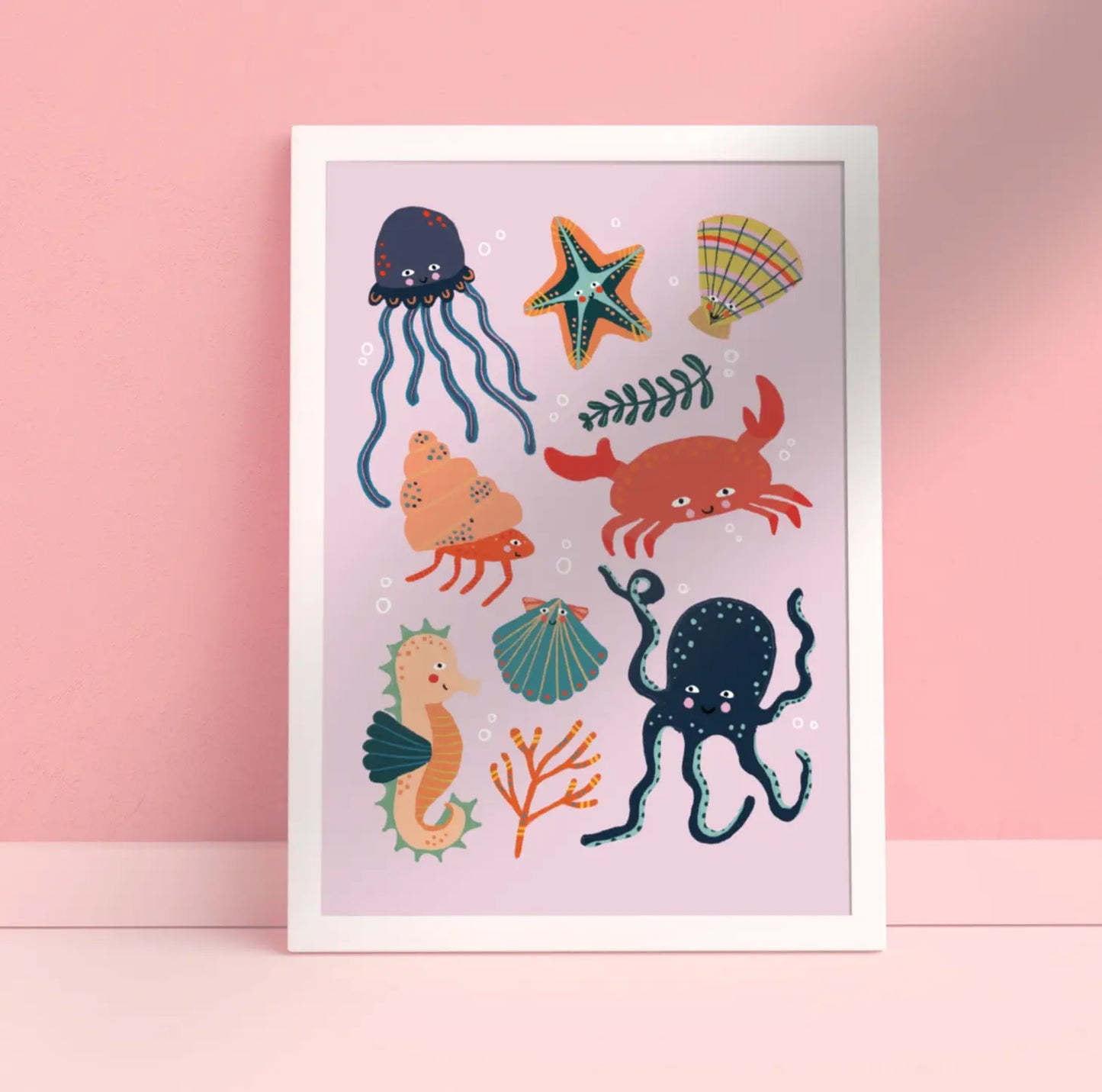 children's print with colourful characters including a crab, seahorse, octopus starfish and much more