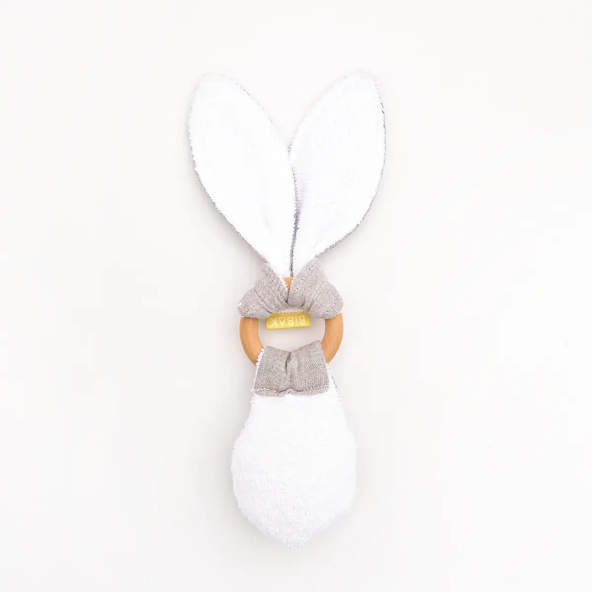 back of a greige rabbit rattle/teether - white towel material