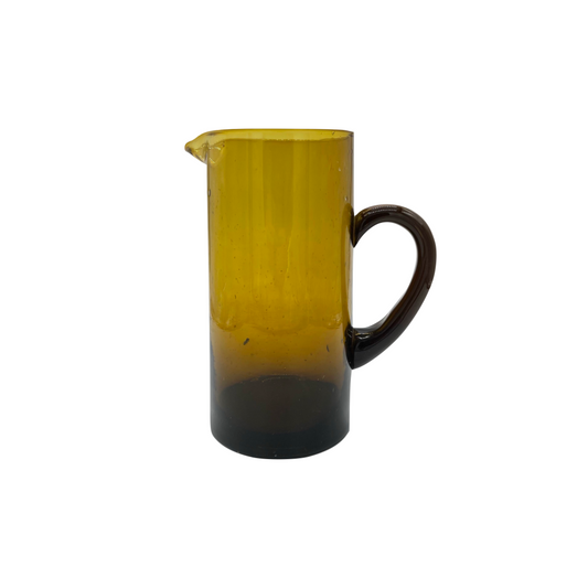 yellow brown glass jug with handle