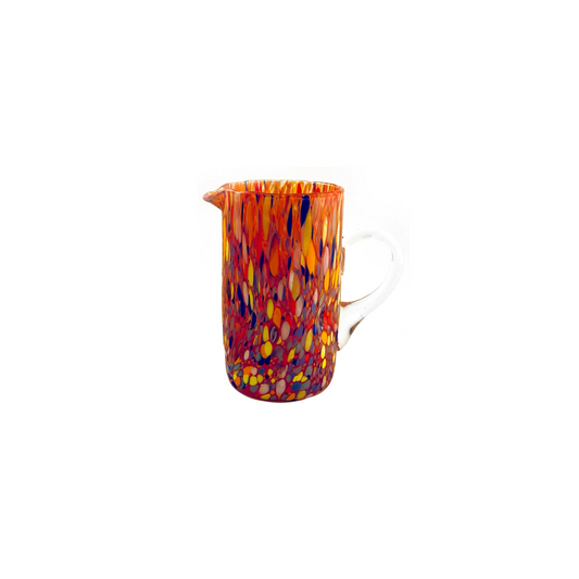 orange glass jug with colourful splatter in orange, red, blue, yellow and white